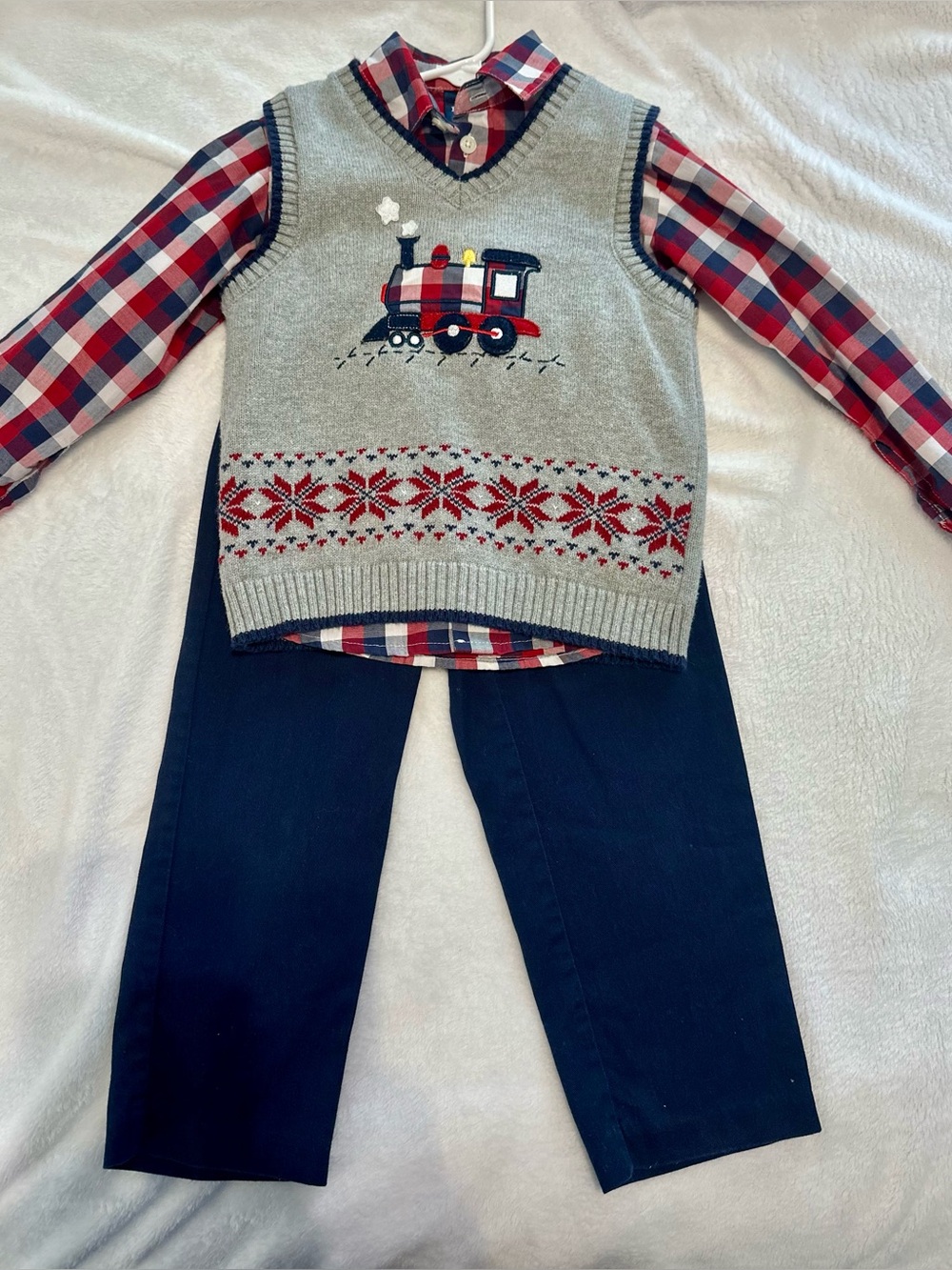 3 piece Izod Sweater Vest with Red Train with plaid button up and navy pants